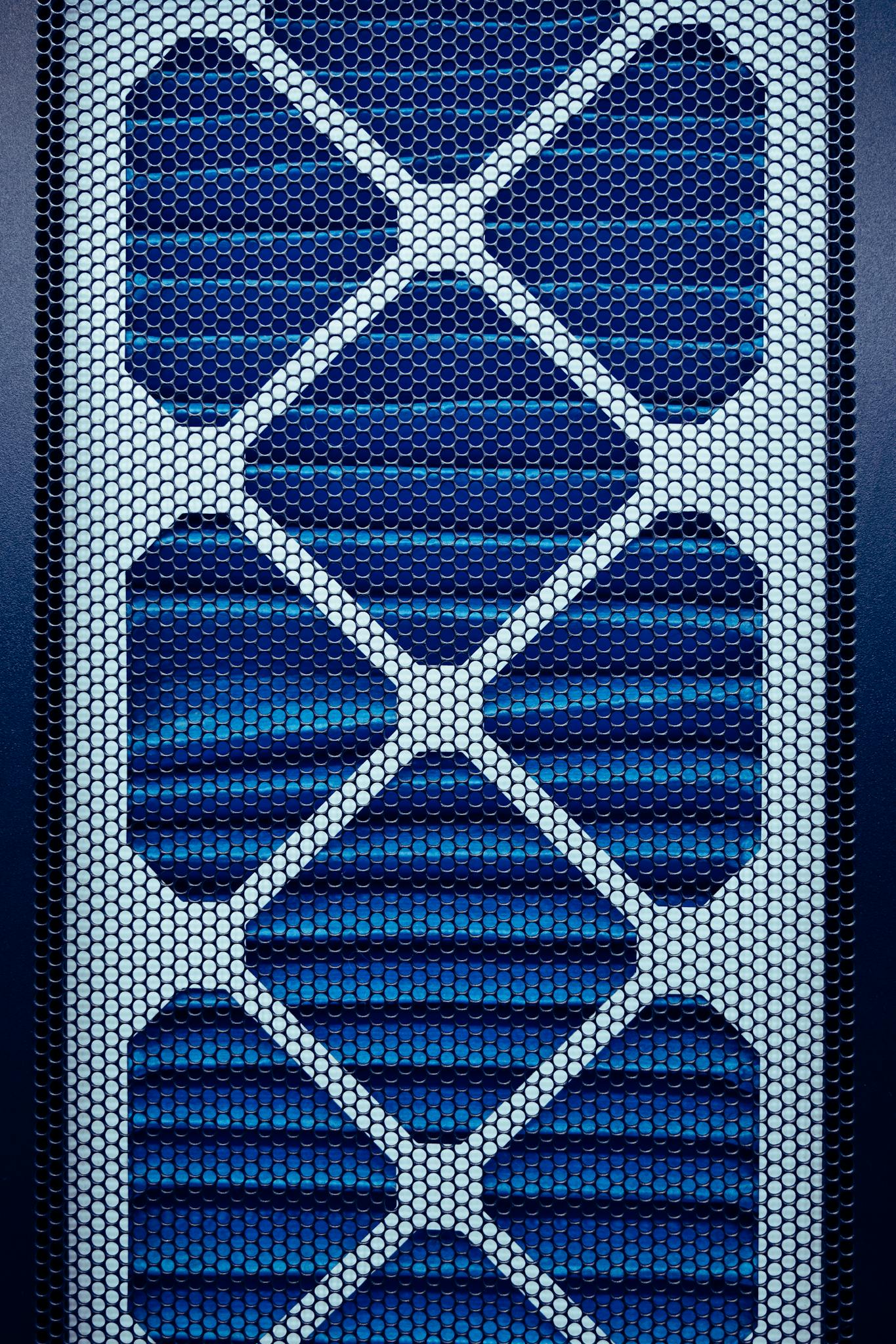 Full frame background of metal frame with holes of air filter pleated panel